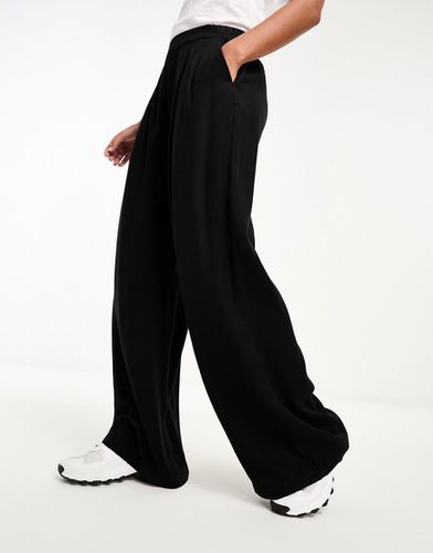 Pantalon ample coupe épurée - Asos Design - Modalova