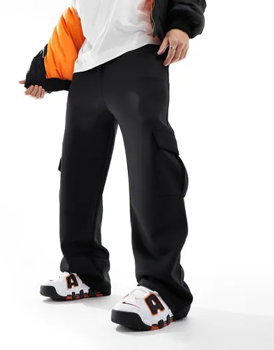 Pantalon de jogging ample en néoprène à poches cargo - Asos Design - Modalova