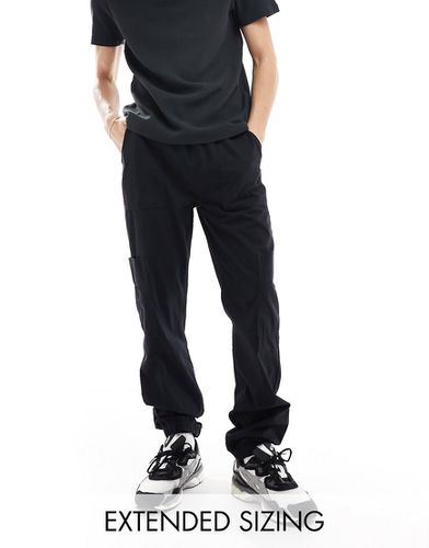 Pantalon de jogging cargo à enfiler avec taille élastique - Asos Design - Modalova