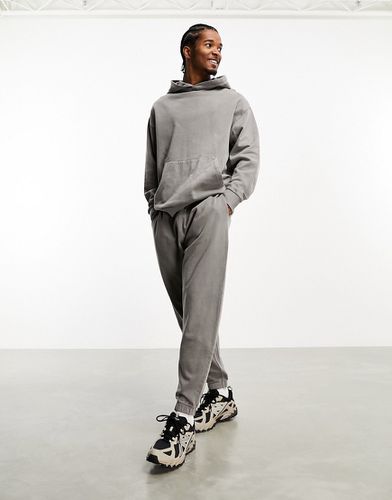 Pantalon de jogging d'ensemble oversize - surteint délavé - Asos Design - Modalova