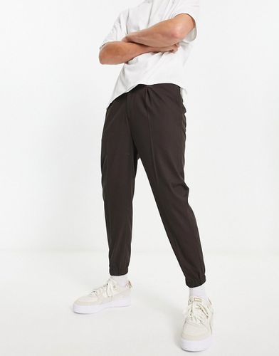 Pantalon de jogging élégant coupe fuselée - Chocolat/ - Asos Design - Modalova