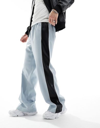 Pantalon de jogging imitation cuir à bandes latérales - Asos Design - Modalova