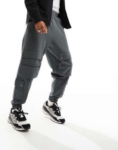 Pantalon de jogging oversize avec plusieurs poches - Noir délavé - Asos Design - Modalova