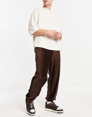 Pantalon de jogging oversize en velours côtelé - Asos Design - Modalova