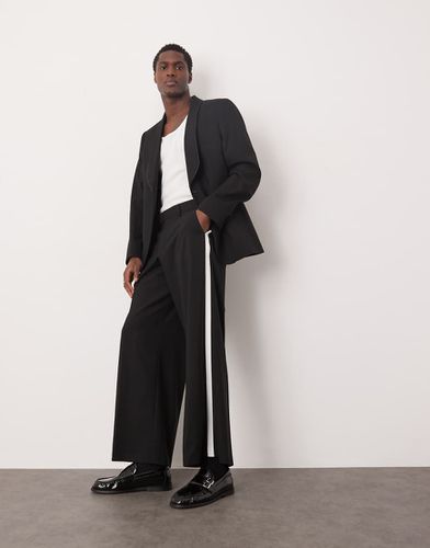 Pantalon de smoking ample habillé avec bande latérale - et blanc - Asos Design - Modalova