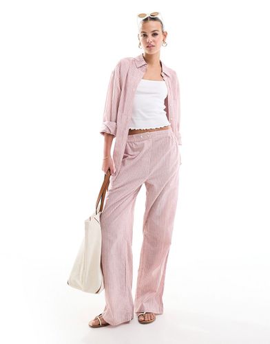 Pantalon d'ensemble facile à enfiler avec patte à la taille - Rayures - Asos Design - Modalova