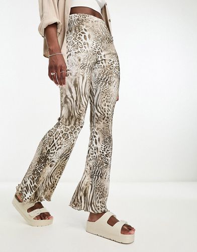 Pantalon évasé plissé à imprimé animal mélangé - Asos Design - Modalova