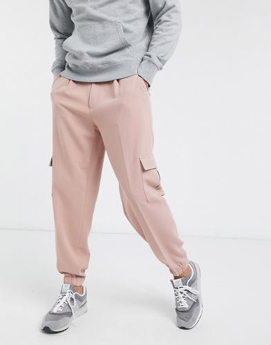 Pantalon habillé oversize style jogger coupe ajustée avec poche cargo - Asos Design - Modalova