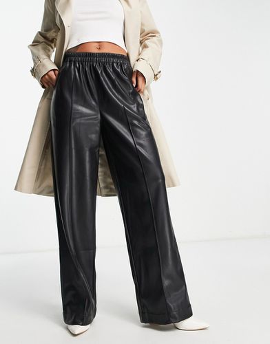Pantalon large oversize en similicuir - Asos Design - Modalova