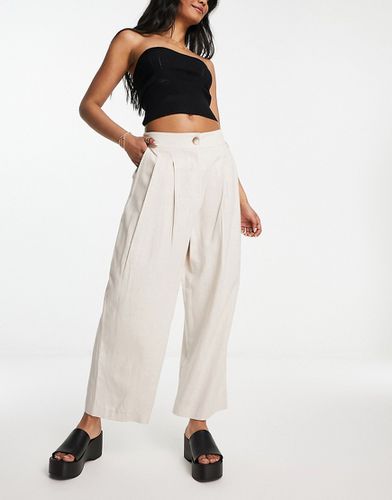 Pantalon plissé coupe fuselée en lin - Taupe - Asos Design - Modalova