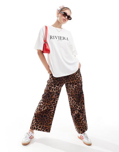 Pantalon raccourci à enfiler à imprimé léopard - Asos Design - Modalova