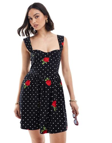 Robe caraco courte à broderies - Noir à pois blancs - Asos Design - Modalova