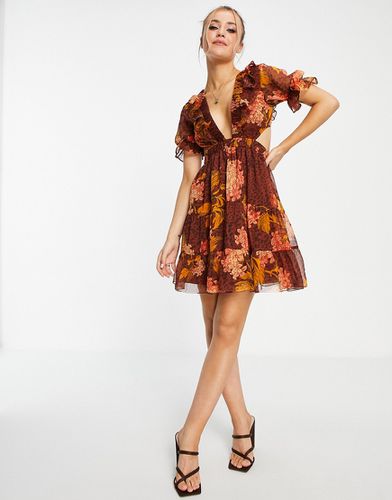 Robe courte à imprimé mixte floral et animal avec dentelle dans le dos - Asos Design - Modalova