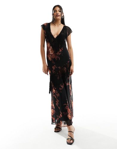Robe sans manches mi-longue à imprimé fleuri avec col V et franges - Asos Design - Modalova