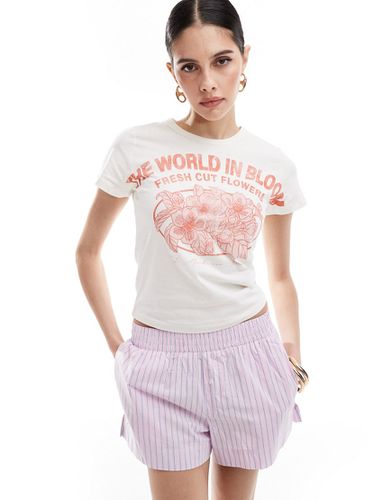 T-shirt effet rétréci à imprimé fleurs - Crème délavé - Asos Design - Modalova