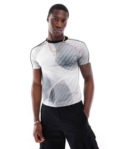 T-shirt moulant à imprimé sportif sur l'ensemble - Asos Design - Modalova