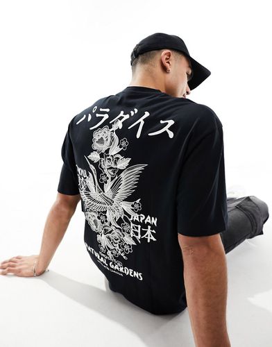 T-shirt oversize imprimé fleuri au dos et sur la poitrine - Asos Design - Modalova