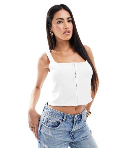 Top bustier ajusté avec agrafes - Crème - Asos Design - Modalova