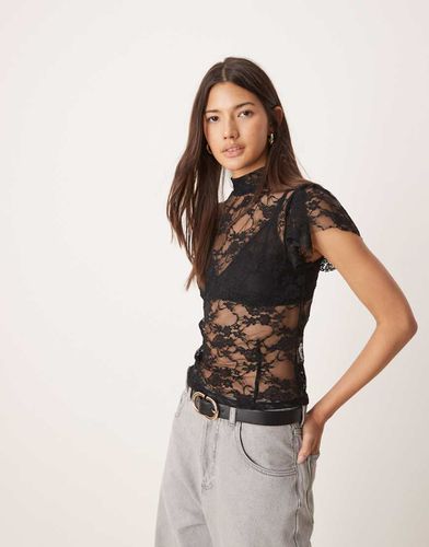 Top en dentelle à manches ange et col montant avec découpe goutte d'eau au dos - Asos Design - Modalova