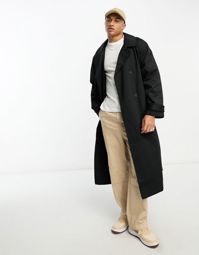 Trench-coat ultra oversize à carreaux - Asos Design - Modalova