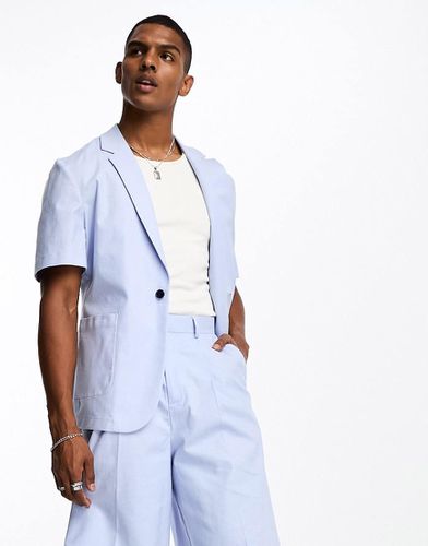 Veste de costume ajustée à manches courtes en lin mélangé - Asos Design - Modalova