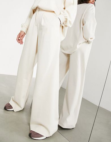 Pantalon à taille haute en jersey texturé - Crème - Asos Edition - Modalova