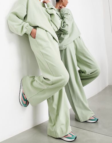 Pantalon à taille haute en jersey texturé - sauge - Asos Edition - Modalova