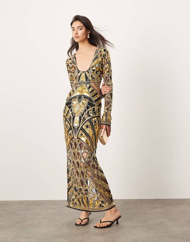 Robe longue ornementée à sequins et découpes avec manches longues et décolleté plongeant - et doré - Asos Edition - Modalova