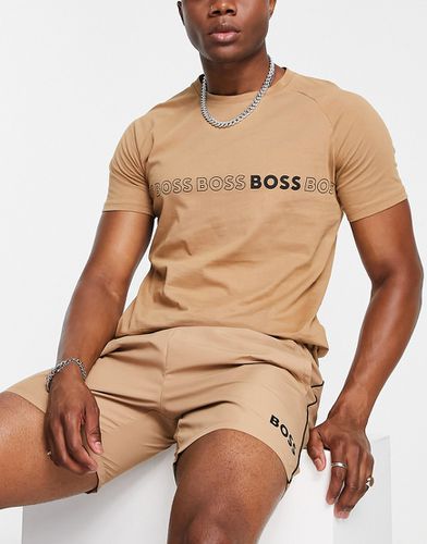 BOSS Swimwear - T-shirt ajusté avec logo répété central - Beige - BOSS Bodywear - Modalova