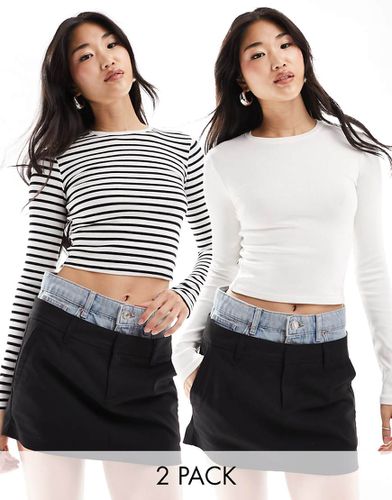 Lot de 2 t-shirts à manches longues en maille côtelée - Rayé et blanc - Bershka - Modalova