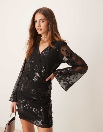 Robe cache-caur courte à fleurs en jacquard texturé et brillant - Gina Tricot - Modalova