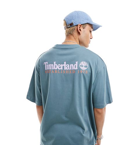 Exclusivité ASOS - - T-shirt oversize avec grande inscription logo imprimée au dos - Bleu - Timberland - Modalova