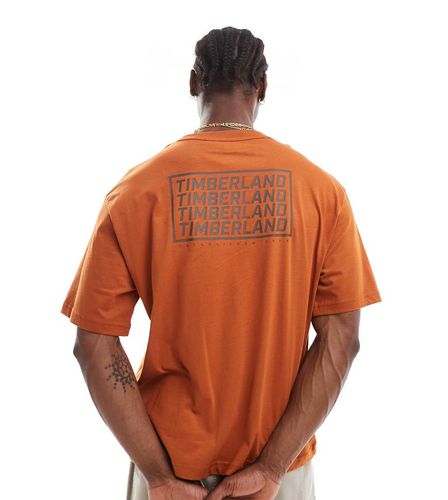 Exclusivité ASOS - T-shirt oversize avec logo répété - Timberland - Modalova