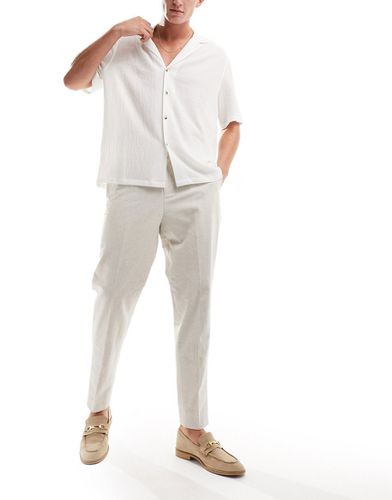 Pantalon plissé en lin à taille haute - Écru - Harry Brown - Modalova