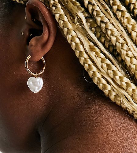 Boucles d'oreilles en plaqué or avec pendant caur - Orelia - Modalova