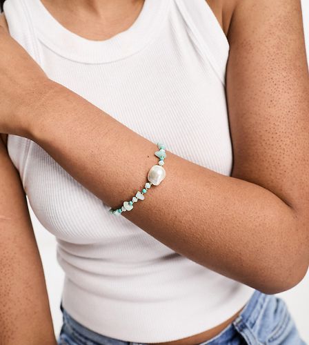 Bracelet en plaqué or orné de perles avec pépites en turquoise - Orelia - Modalova