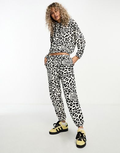 Pantalon de jogging d'ensemble à imprimé léopard - Love Moschino - Modalova