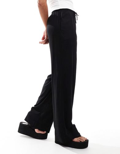 Pantalon avec cordon coulissant à la taille - Noir - Monki - Modalova