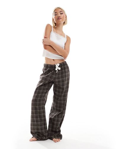 Pantalon de pyjama en flanelle à carreaux - Monki - Modalova