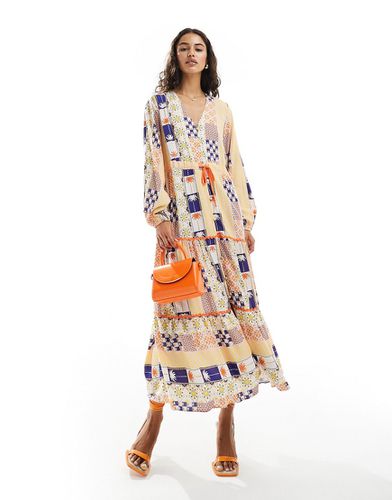 Robe longue à bordures contrastantes et imprimé soleil - Never Fully Dressed - Modalova