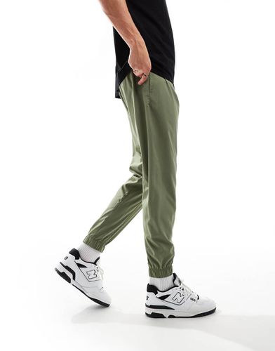 Sport Essentials - Pantalon de jogging tissé - New Balance - Modalova