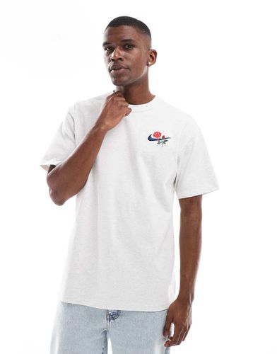 T-shirt avec logo virgule et fleur - clair - Nike - Modalova