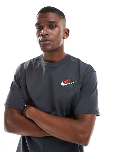 T-shirt avec logo virgule et fleur - foncé - Nike - Modalova