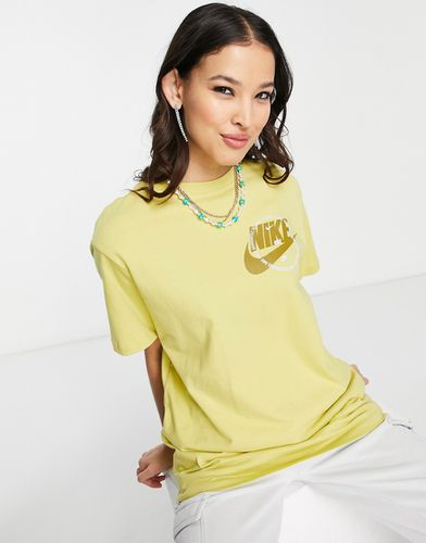 T-shirt fonctionnel coupe masculine à logo graphique - céleri - Nike - Modalova