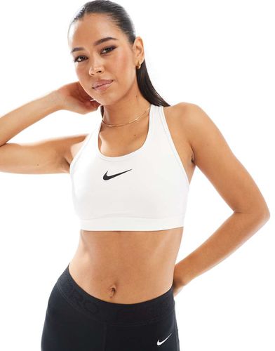 Brassière de sport à maintien renforcé et logo virgule - Nike Training - Modalova