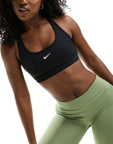 Nike - Training - Brassière de sport à soutien léger et logo virgule - Nike Training - Modalova