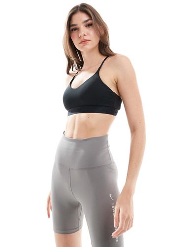 Indy - Brassière de sport maintien léger en tissu Dri-FIT - Noir - Nike Training - Modalova