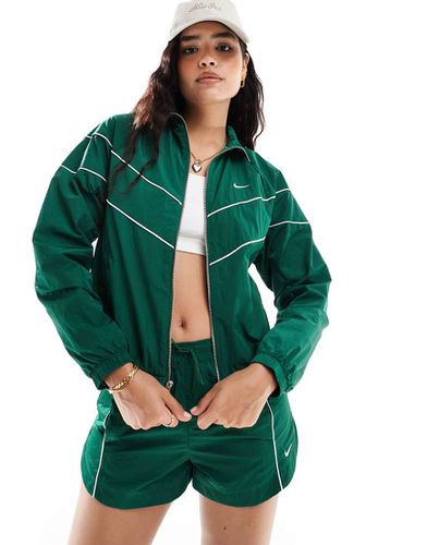 Windrunner - Veste avec passepoils en chevrons - cascade et crème - Nike - Modalova