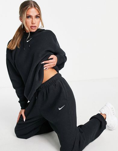 Jogger taille haute en peluche avec petit logo virgule - Nike - Modalova