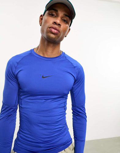 Nike Pro - Top de sport ajusté en tissu Dri-FIT à manches longues - roi - Nike Training - Modalova